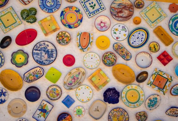 Traditional orange-glazed earthenware pottery on display at a craft workshop in CYPRE, the historic ceramic village on the São Brás de Mexiquelós to Almodôvar road in the Algarve interior