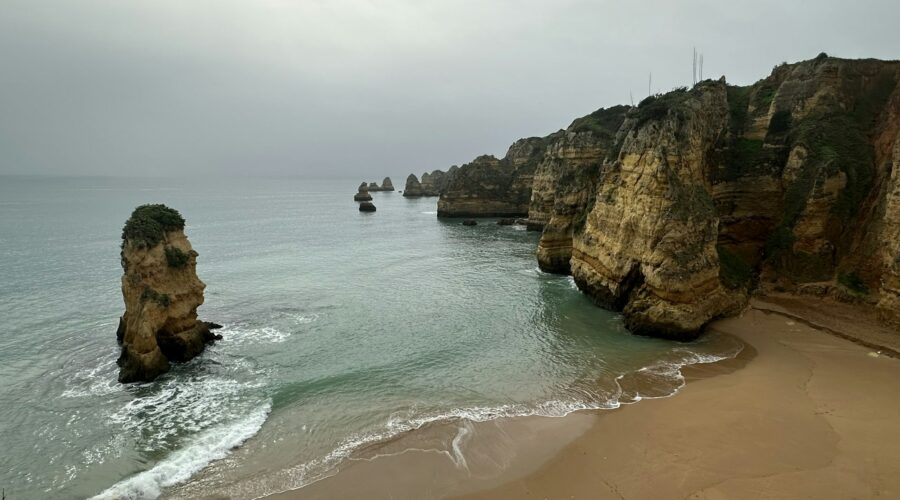 Praia do Poente, Lagos: The Cliff-Backed Cove at the Western Edge of the Bay